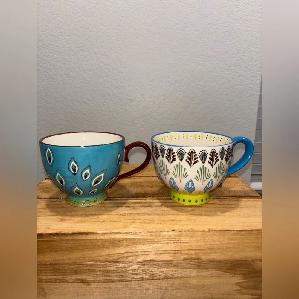 Set of 2 Pier 1 Imports Dolomite Ellie Peacock Hand Painted Footed Mugs 16oz